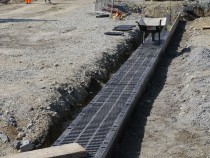 FASERFIX SUPER channels with ductile iron gratings, class D 400 being installed at the Shetland Gas Plant